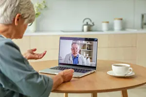 Video Prints: Senior doctor expert examine older seniors online
