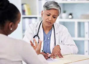 Doctors Prints: Senior doctor, patient and writing prescription