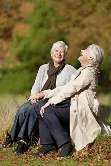 Getaway Prints: Senior friends, laughing or conversation in nature for travel