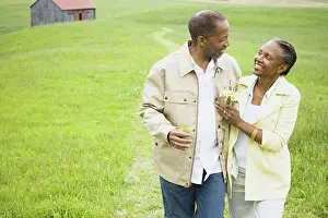 Straight Prints: Senior man and a senior woman looking at each other