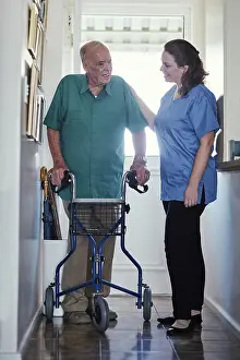 Disability Prints: Senior man, walker and support with nurse for physiotherapy