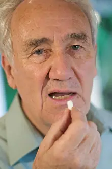 Grandfather Prints: Senior Taking Vitamin/Medication