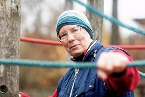 Tenacity Prints: Senior woman exercising in park
