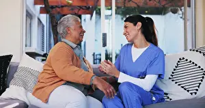 Retirement Home Prints: Senior, woman and nurse with conversation on sofa for healthcare support