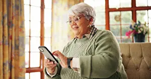 Texting Prints: Senior woman, scroll or phone on sofa for online news