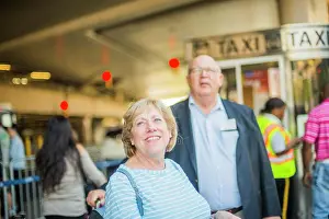 Elderly Prints: seniors waiting for taxi at airport