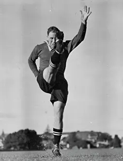 Sports Ball Prints: This is the third of a series of six photograph showing Bob's action as he kicks for goal