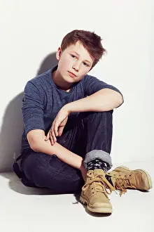 Thoughtful Prints: Serious, teenager and portrait of boy with fashion sitting in white background of studio