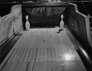 Alley Prints: Seven ten split arrangement of bowling pins at end of bowling alley lane