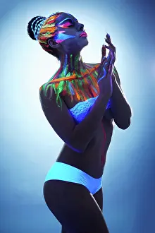 Hellhaeutig Prints: Sexy young woman posing with glowing body art Image of sexy young woman posing with glowing body art