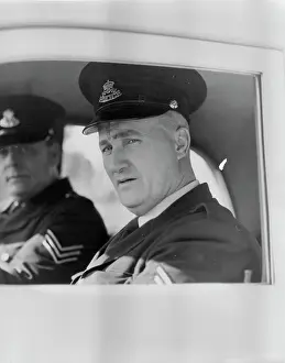 Police Force Prints: Sgt. R. Newman of Waverley, after he had left the Eastern Subs Hospital where he received treatment