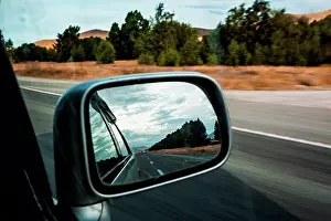 Highways Prints: Side-view mirror reflection of car driving along State Highway 8