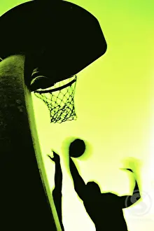 Sseditor Aa Prints: Silhouette of two men playing basketball