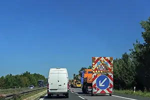 Highways Prints: Single lane narrowing due to roadworks vehicle on the A6 motorway