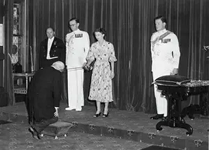 Queen Royal Person Prints: Sir Brian Swift, a ***** receiving his accolade from the Queen at Gove.March 2, 1954