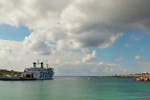 Sicily Prints: Siremar, car ferry at anchor, Lampedusa town