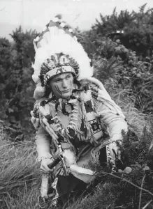 Indians Prints: Sitting Crow Stalks The Sussex Downs -- Redskin in full Indian hunting dress stalking on the Sussex Downs in 17 years