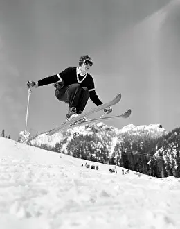 Agility Prints: Skier jumping over slope