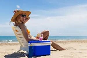 Bikini Prints: slender blonde in a bright bikini