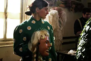 Celebrations Prints: Slovenian carnival parade participant holding her mask; Cerkno, Slovenia