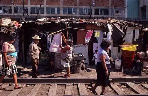 Medium Group Of People Prints: SLUMS, MEXICO CITY. Borde de Vias Colony