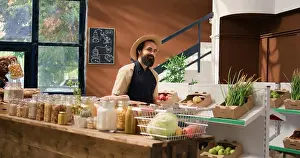Produce Prints: Small business owner arranging organic products on display