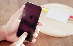 Electronic Prints: Smart phone in a woman's hand