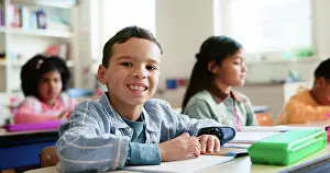 Notebook Prints: Smile, writing and portrait of child in classroom with confidence for education