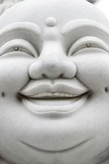 Religious Art Prints: Smiling Buddha or big happy Maitreya Buddha statue. Danang. Vietnam