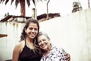 Grandma Prints: Smiling family portrait of Mexican female generations