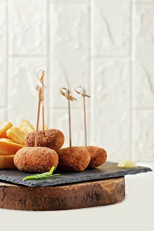 Eggs Prints: Snack of ham croquettes and chips ready to eat