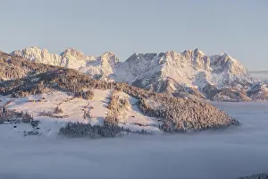 Untouched Prints: Snowy mountain landscape at sunrise in Kitzbühel, Tyrol, Austria