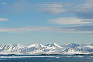 Global Warming Prints: Snowy mountain landscape in Woodfjorden