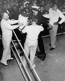 Picture Prints: Snowy Robins. Ace Choclate being helped to his feet ambulance man signals for help