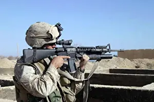 Surveillance Prints: Soldier firing with M16A2 machine gun during Operation Khanjar, Iraq