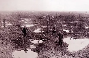 Footprints Prints: soldiers walking through mud in France during World War One. Dated 1914