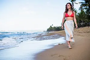Caribbean Prints: Solo Woman in a bikini with towel at the beach in Puerto Rico