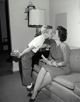 4 5 Years Prints: Son kissing his mother