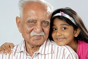 Grandfather Prints: South Asian Indian grandfather and granddaughter looking at camera MR#152