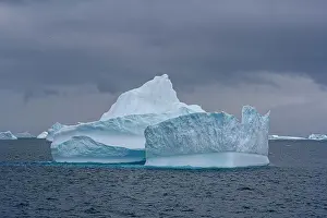 South Georgia Prints: South Georgia Island. Sculpted blue icebergs floating in the Atlantic
