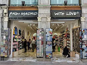 Urban Environment Prints: Souvenir shop with tourists in the city centre