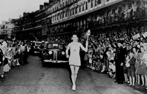Torch Prints: SP Olympics 1948 - London Olympic Torch -- Peet Officer Barney Barnes who had the honor of bearing the torch ashore