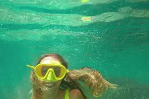 One Young Woman Only Prints: Spain, Mallorca, Smiling woman in scuba mask diving in sea