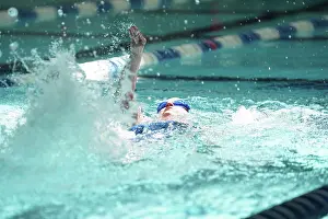 Air Force Prints: A Special Olympics Mississippi athlete competes in a swimming event at the Biloxi Natatorium in Biloxi