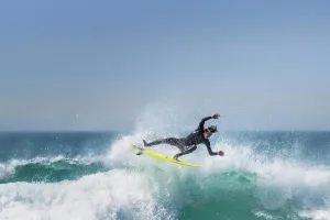 Focused Prints: Spectacular action as a surfer rides a wave at Fistral in Newquay in Cornwall