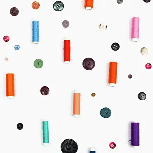 2016 Prints: spools of sewing thread and different buttons spools of sewing thread
