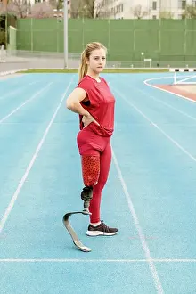 Working Out Prints: Serious sportswoman during track and field training