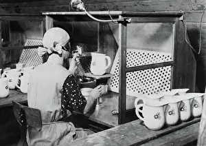 Spray painting by fume cabinet, Gustafberg's porcelain factory