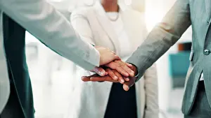 Partnership Prints: Stack of hands, solidarity and business people in office with collaboration