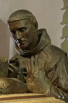 Verticals Prints: Statue of Father Crespi presiding over Father Junipero Sera sarcophagus - CARMEL